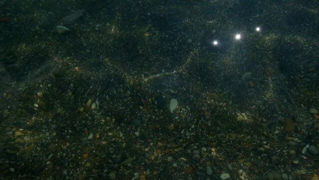 WATER SURFACE WITH FLASH ON THE SEA