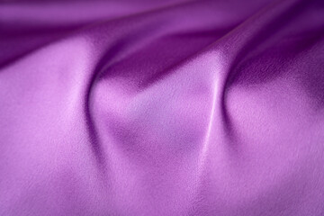 Purple shiny satin fabric texture bg	