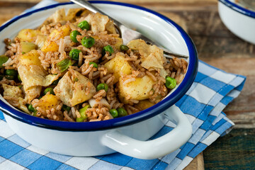 Spicy pineapple fried rice with green peas