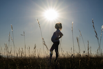 
silhouette of a pregnant woman