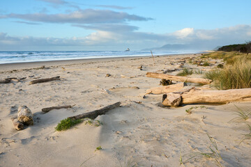 View of the ocean beach at sunset on the Oregon coast.