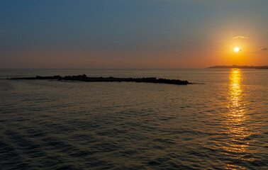 Landscape at dusk. Beautiful view of the sea bay of Antalya at sunset.