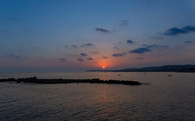 Landscape at dusk. Beautiful view of the sea bay of Antalya at sunset.