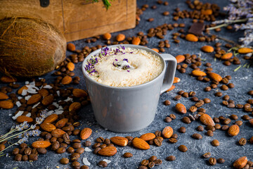 raf coffee lavender with coconut on cup on grey table - obrazy, fototapety, plakaty