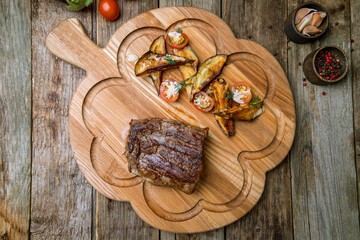roast beef Steak with auberdine on the board top view