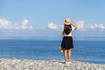 Tourist woman go Manbo stone beach in Hualien