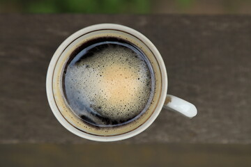 Coffee in a cup on the table