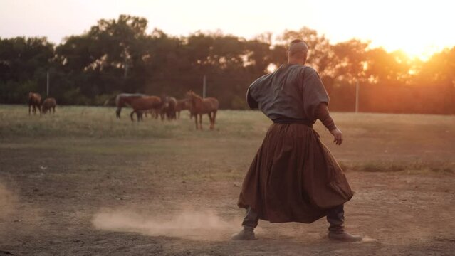 Zaporozhye Ukrainian Cossack. Cossack with a saber in his hands is preparing for battle. Independent Ukrainian people. Patriots of their country.