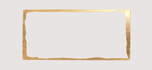 Gold (bronze) glitter empty frame on beige gray paper background. Abstract copy space texture.