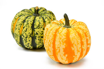 two ripe edible pumpkins on white background isolate