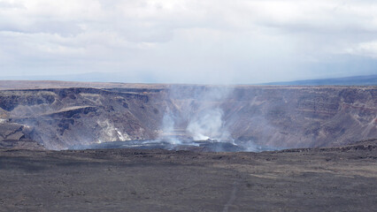 Smoke and steam rising out of Kilauea Caldera in Hawaii's Volcanoes National Park.