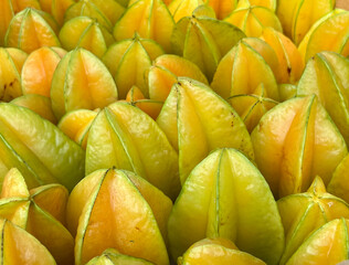 Crate of yellow star fruit (also known as carambola) at a farmers market