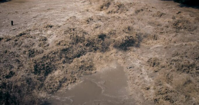 Rivers flood. Crowded river overflows its banks. Raging river with dirty water. Disaster flood deluge and water flow after rainfall.