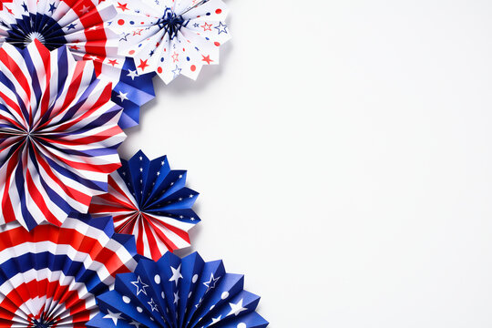 USA national holiday banner design. Frame of American flag color paper fans on white background. Happy Independence day, President's Day, Labor day concept.