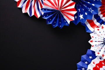 Obraz premium Happy Labor Day banner design. Flat lay American paper fans on black background. USA patriotic decorations top view.
