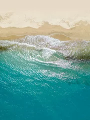 Foto op Canvas An aerial view of a tropical sandy beach and blue ocean. © LUGOSTOCK