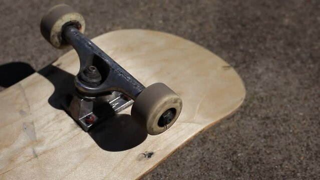 Skateboard Wheels Rolling Mid Afternoon Sunlight Outdoor Lighting