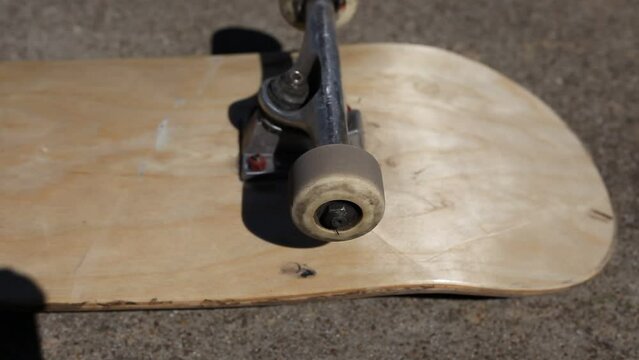 Skateboard Wheels Rolling Mid Afternoon Sunlight Outdoor Lighting