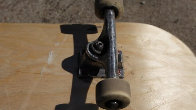 Skateboard Wheels Rolling Mid Afternoon Sunlight Outdoor Lighting