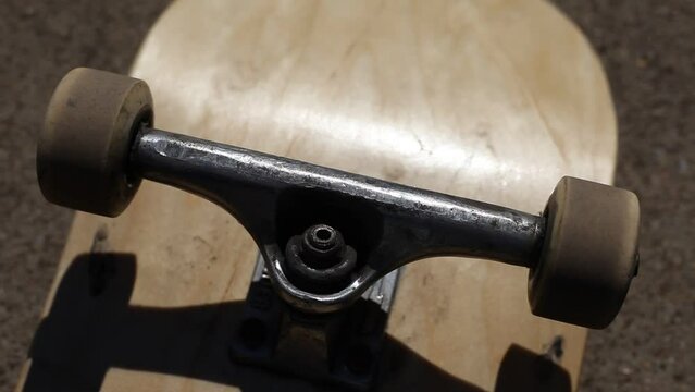 Skateboard Wheels Rolling Mid Afternoon Sunlight Outdoor Lighting