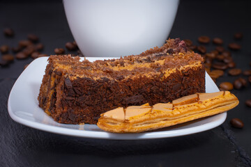 cake with cookies on the background of coffee beans