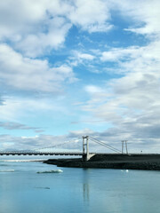 Jökulsárlón bridge over river from gla cier to iceland north sea cold