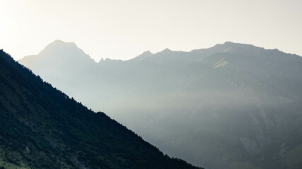 Naklejka premium mountains in the fog