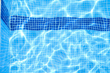 Plakat Beautiful relaxing swimming pool water sun reflection background.