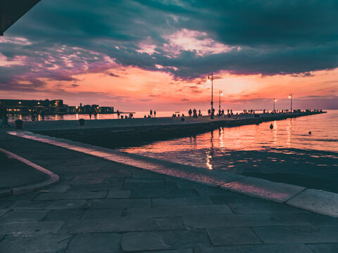 People Run To The Dock Waiting For These Amazing Colors And Lights To Materialize Each Evening