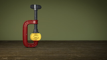 Concept for financial stress or recession. Tight money supply, budget squeeze: USA dollar coin being squeezed between the jaws of a large vise, vice, or clamp.
