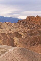 Fototapeta na wymiar multi-hued badlands of Zabriskie Point in Death Valley National Park