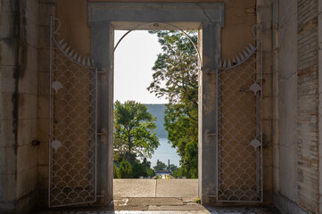Doorway to a view at Untermyer Park. Looking out at the view from the walled garden doorway leading to the stairway to the view of the Hudson River.