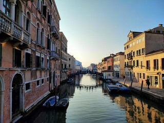 Fototapeta na wymiar Canal Amidst Buildings In City, Cannaregio, Venice