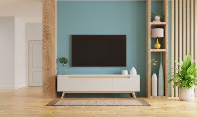 Living Room Interior With Tv And Cabinet On Empty Blue Wall Background.3d Rendering