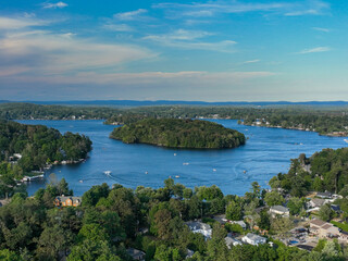Fototapeta na wymiar 08/30/2022 - Late afternoon aerial photo of Lake Mahopac located in Town of Carmel, Putnam County, New York.