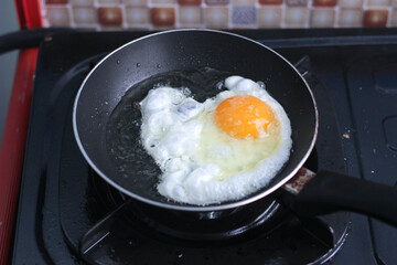 fried egg in a frying pan