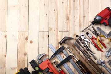 theme corner  tools on a rustic wood banner background. Top view with copy space.