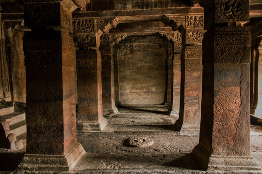Badami cave Interior view with beautiful decorated pillars.