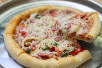 Delicious home made pizza with extra cheese.