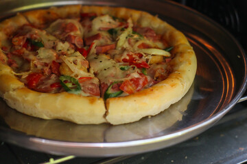 Delicious home made pizza with extra cheese.