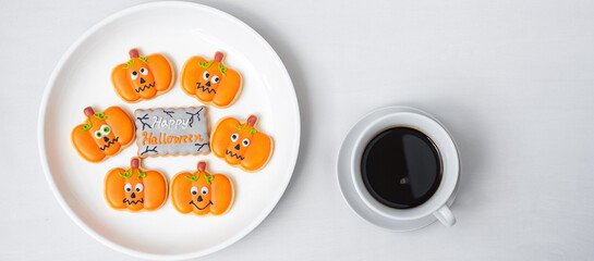 hot coffee cup with funny Halloween Cookies. Happy Halloween day, Trick or Threat, Hello October, fall autumn, Traditional, party and holiday concept
