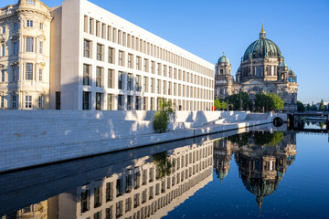 The rebuilt Berlin City Palace with the Catehdral reflected in the river Spree