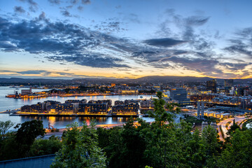 The lights of Oslo in Norway after sunset - obrazy, fototapety, plakaty