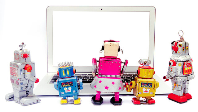 a collection of retro bots watching a laptop PNG 