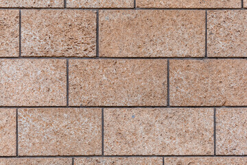 Naklejka premium Texture of a stone wall. Old castle stone wall texture background. Stone wall as a background or texture. Part of a stone wall, for background or texture