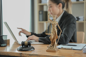 Lawyers having  Concepts of  Legal services at the law office work Legal advice online on computer labor law