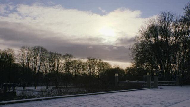 Frogner park in Oslo, Norway, sunset shot with trees