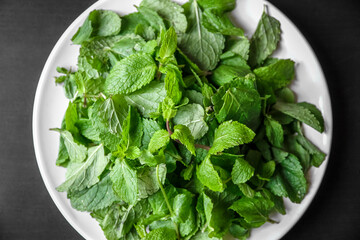 Fresh mint leaves on a plate