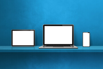 Laptop, mobile phone and digital tablet pc on blue wall shelf. Horizontal background