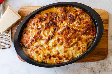 Musaka- top view recording from. Traditional Greek dish of baked layers, eggplant, meat, bechamel...